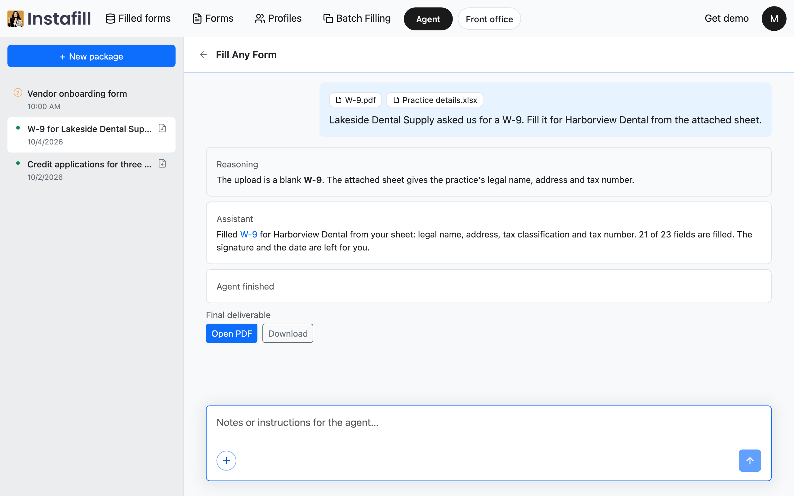 A finished conversation: the agent says the W-9 is filled, links to it, and offers the filled form to open or download