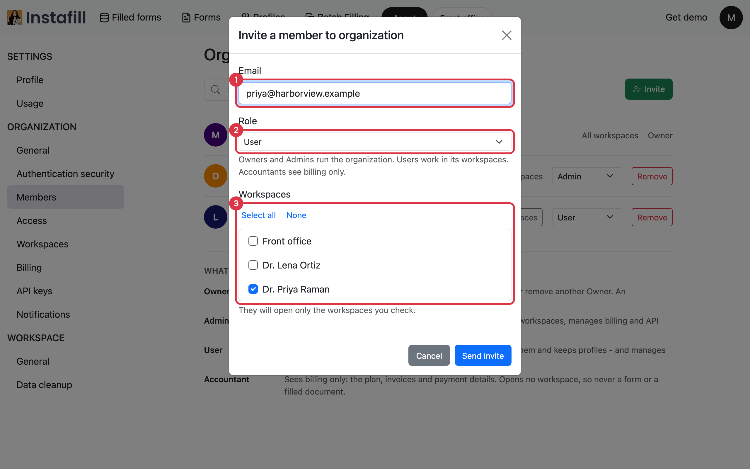 The invitation dialog with an email address, the User role and one workspace checked